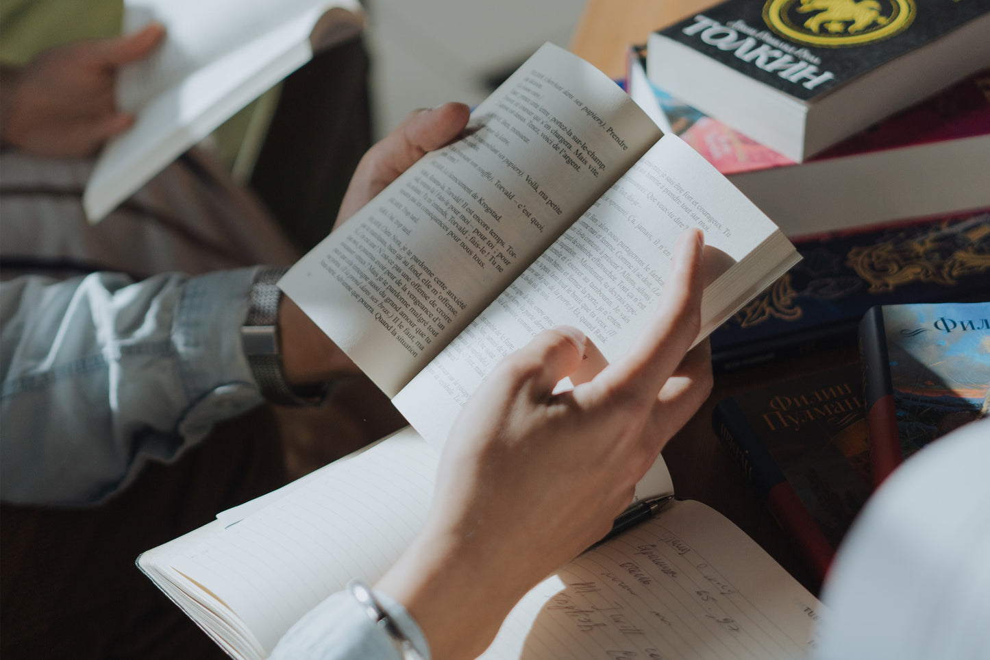 Book being held by an individual