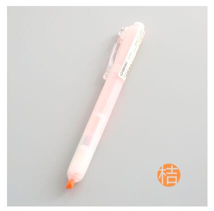 An orange highlighter marker