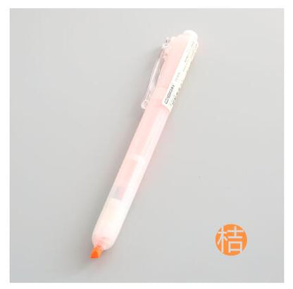 An orange highlighter marker